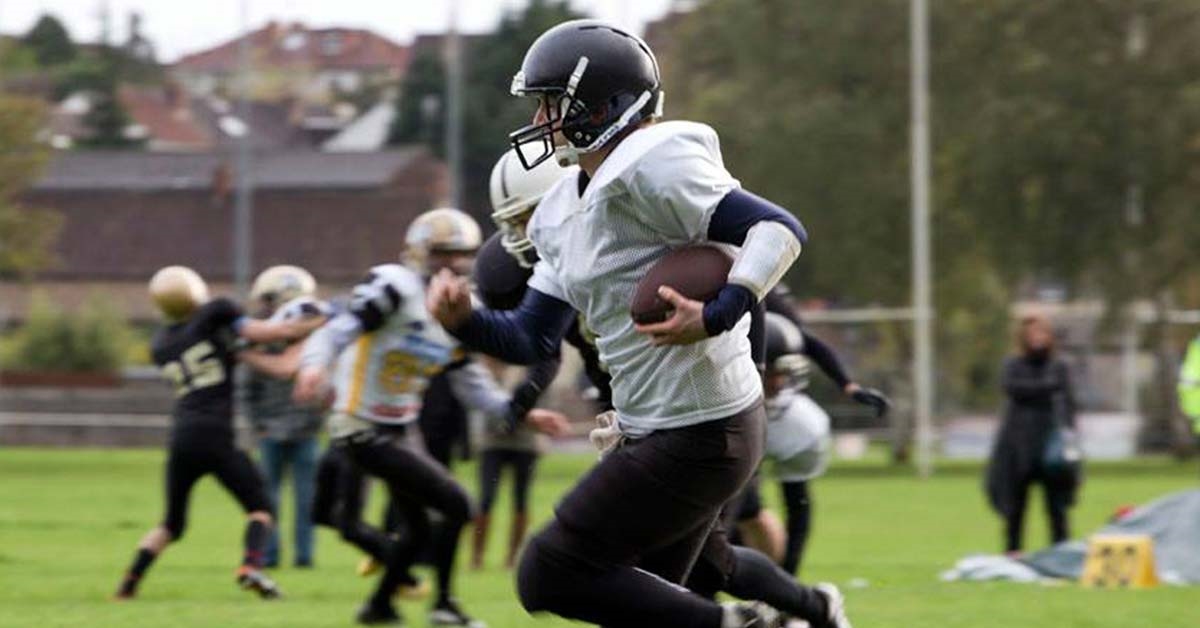 A person playing American Football