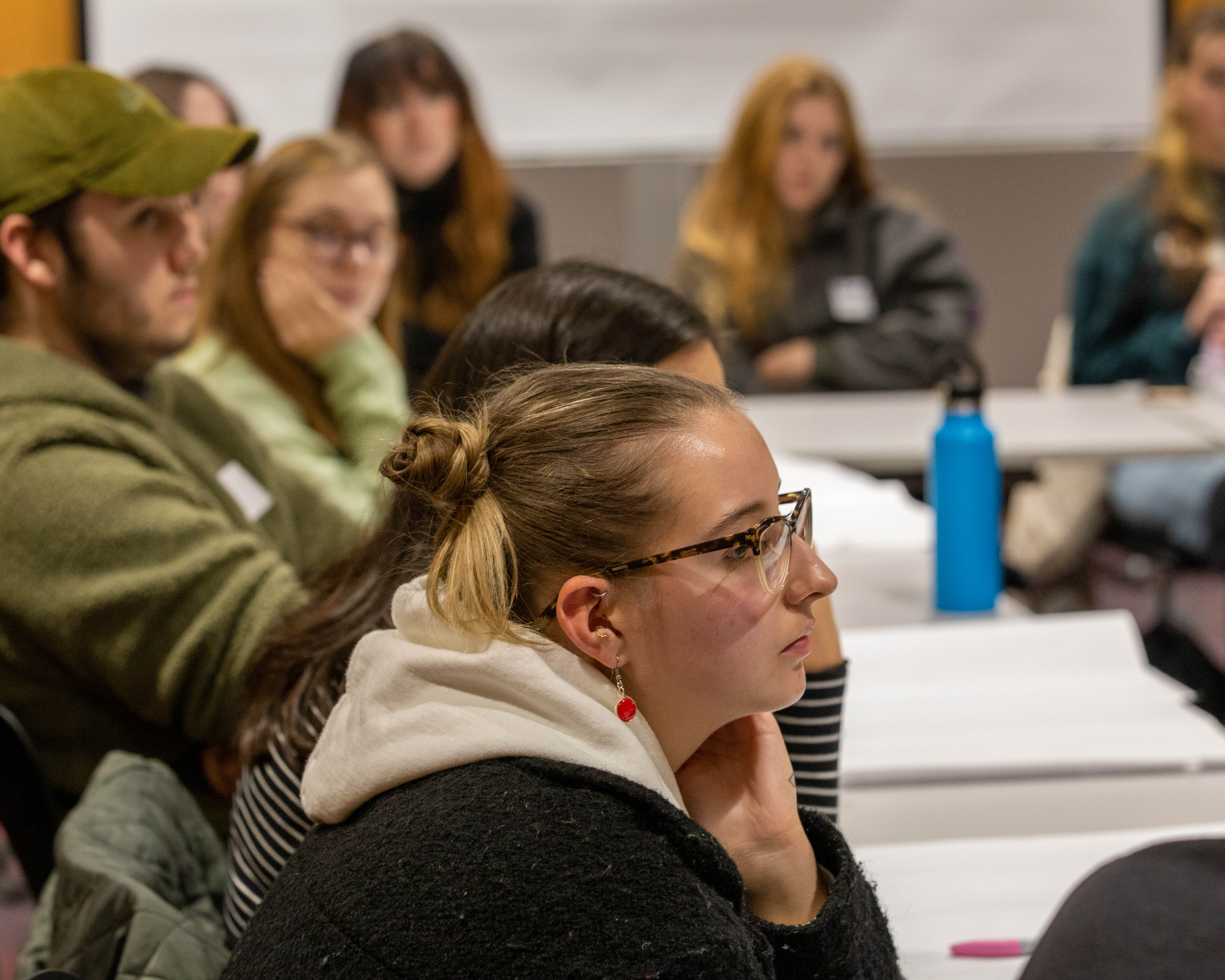 Photo of students sat in lecture theatre