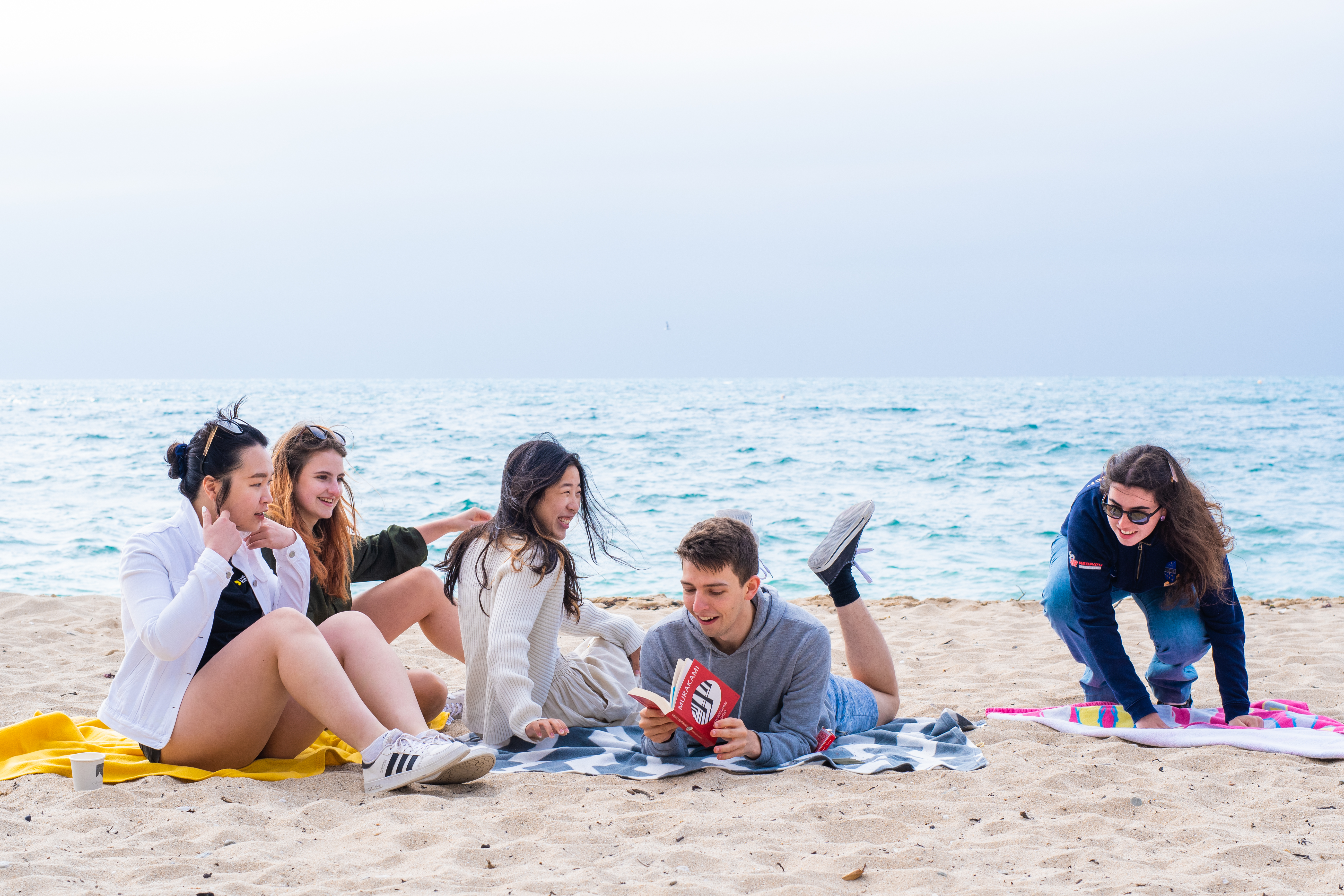 Students enjoying the beach.