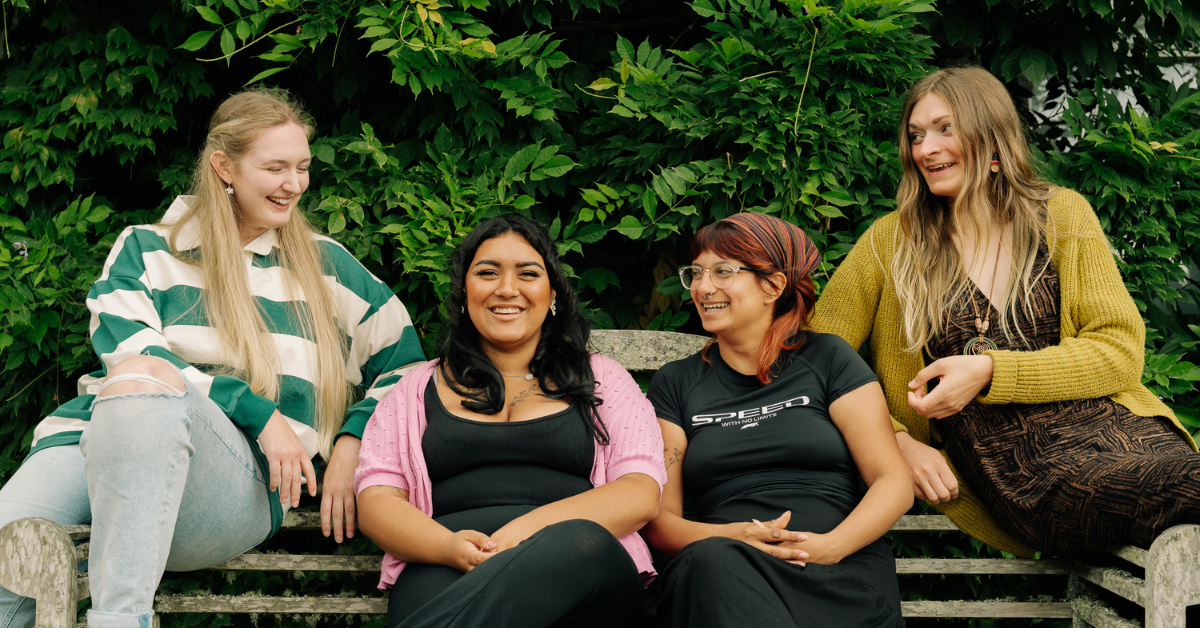Image shows the four Presidents sat on a bench.